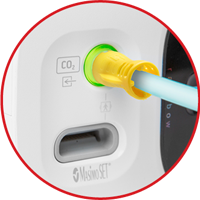 Rad-97 capnography module with color-illuminated gas inlet indicator showing device status.